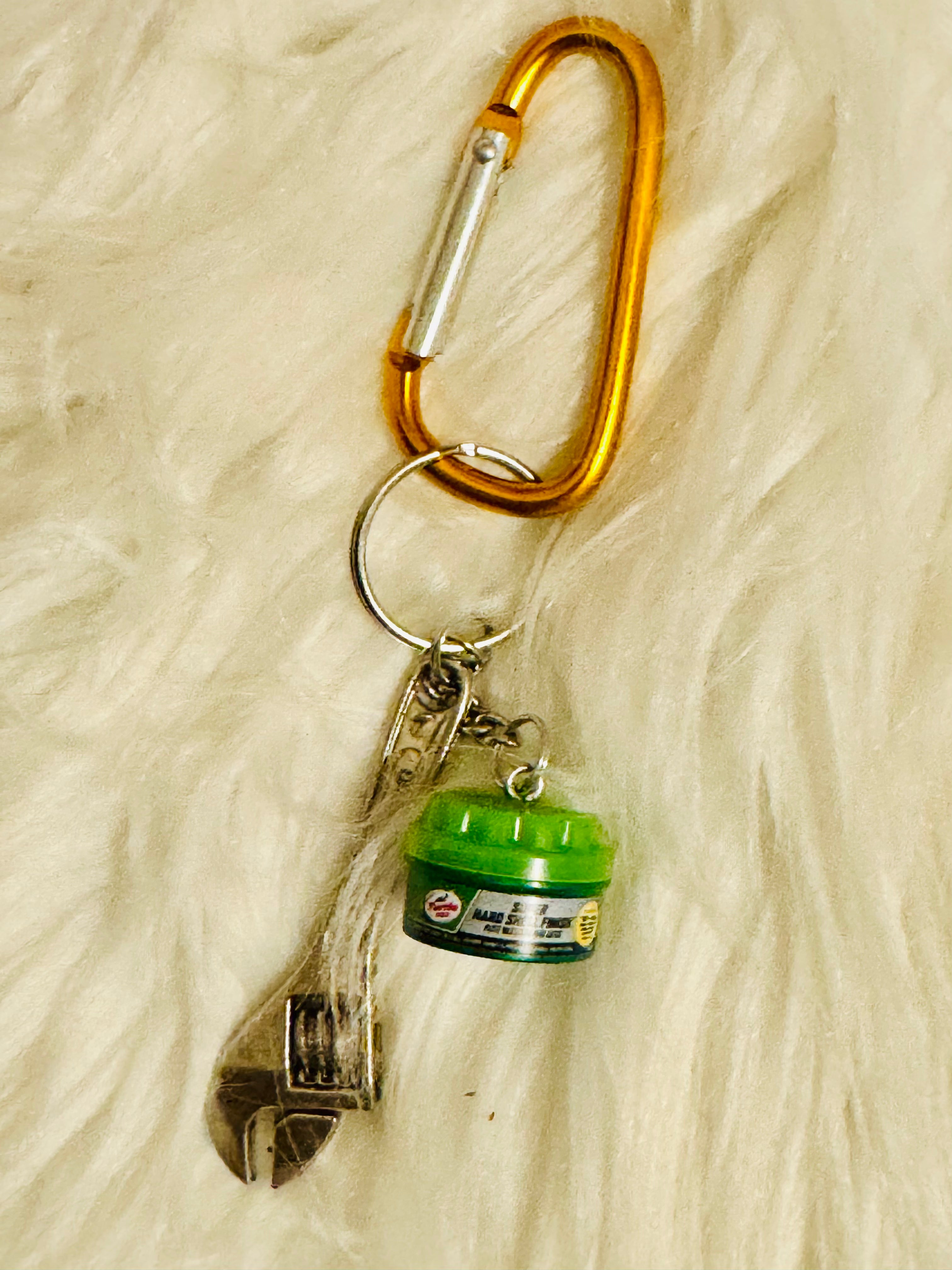 Mini Brand wax and wrench keychain